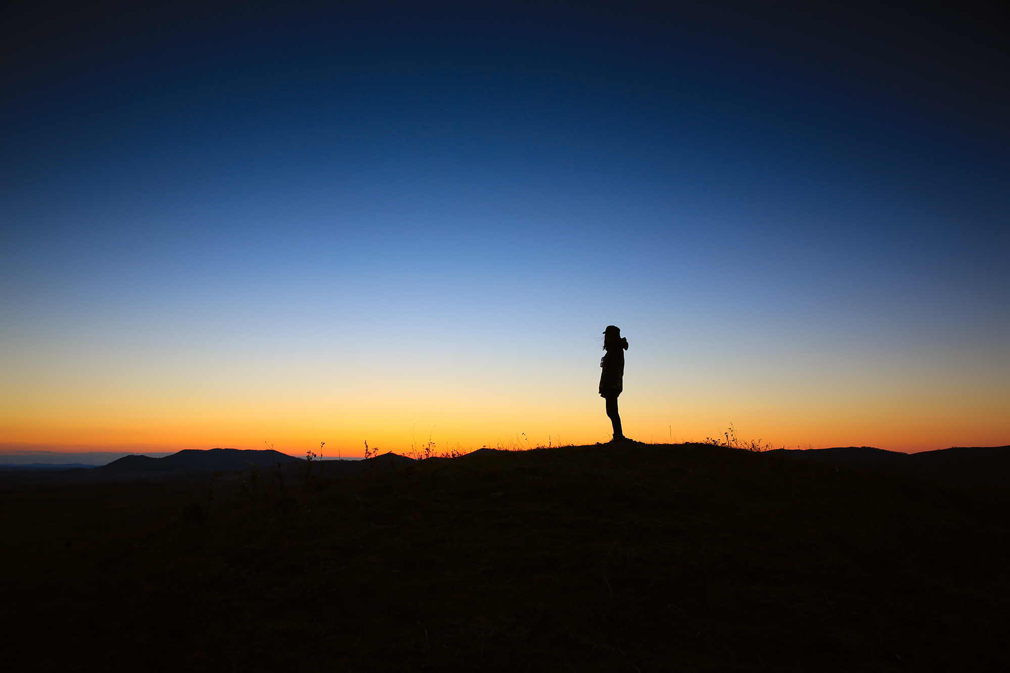 Unsplash Lone Hiker at Sunset